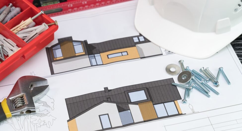 Construction design documentation and tools on the table