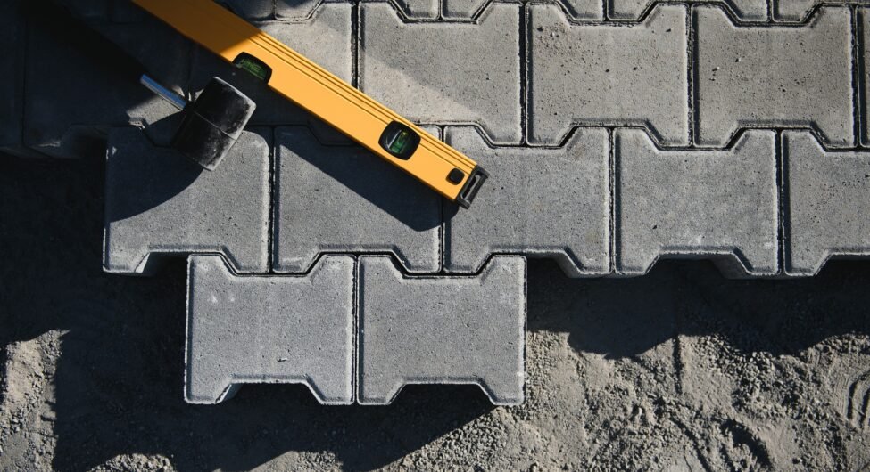 Laying paving stones. Paving tools for use